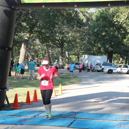 Runners cross the finish line.