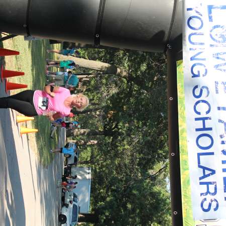 Runners cross the finish line.