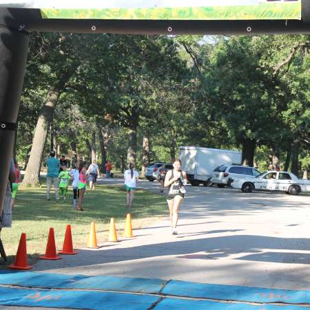 Runners cross the finish line.