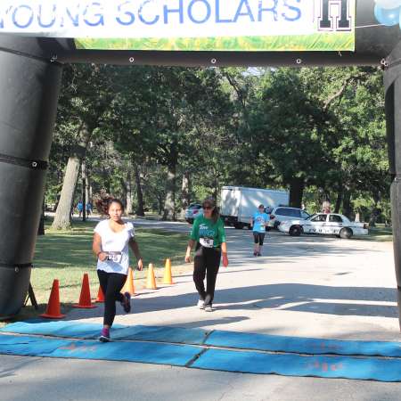 Runners cross the finish line.