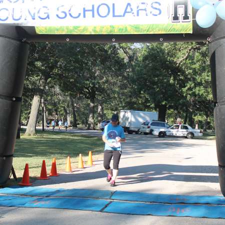 Runners cross the finish line.