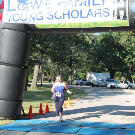 Runners cross the finish line.