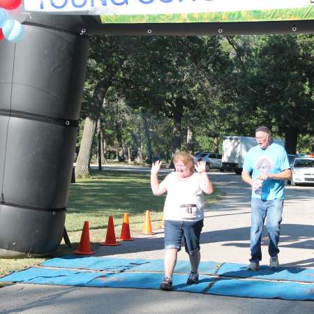 Runners cross the finish line.