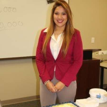 College Graduate Vanessa C. with her cake!