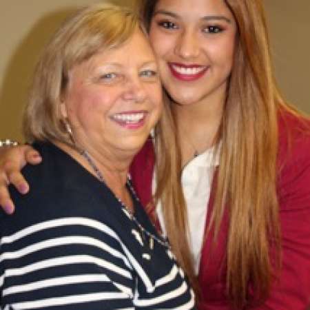 Vanessa and her mentor at a brief reception for her graduation at QM.