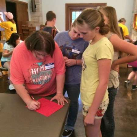 Volunteers check supplies.