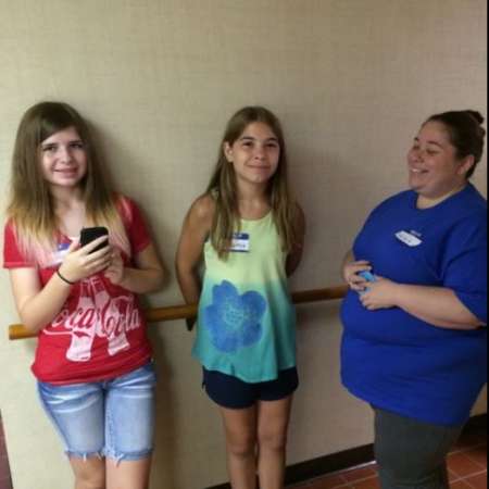 Students waiting after completing backpacks.