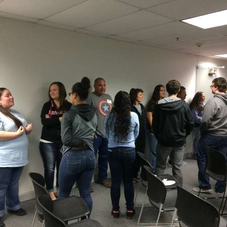 Teambuilding activity where parents and students speak to each other using open ended questions.