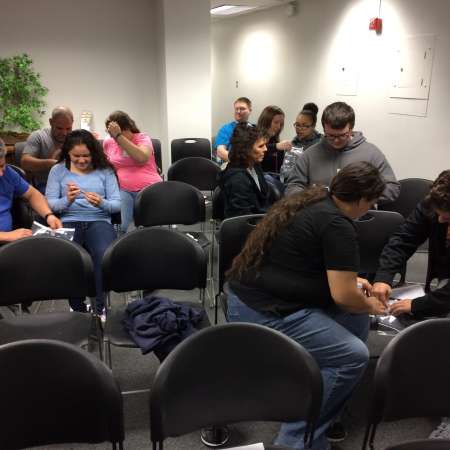 Students working on their paper airplanes as part of the learning to overcome failure presentation.