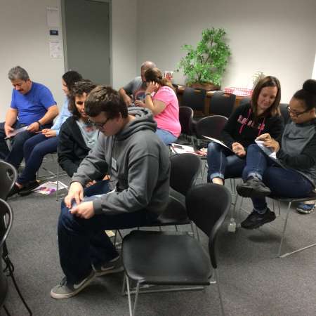 Students working on their paper airplanes as part of the learning to overcome failure presentation.