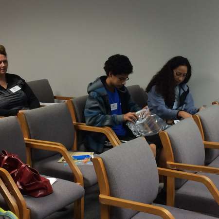 Students working on their paper airplanes as part of the learning to overcome failure presentation.