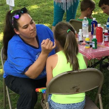 Daniel & Elizabeth paint faces at SunFest.