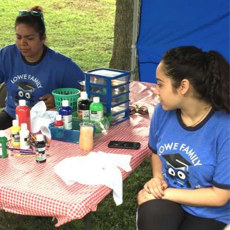 Jazmin volunteers at SunFest booth.