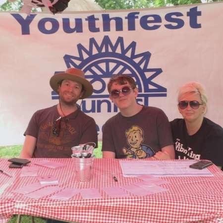 Landry, Angela and Mentor Nic volunteer at SunFest.