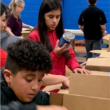 Students and Parents volunteer at Salvation Army.