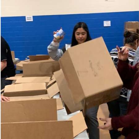 Students and Parents volunteer at Salvation Army.