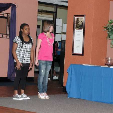Students help in fashion show.