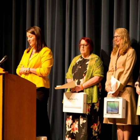 Students receive their Scholarships at the Awards Assembly.