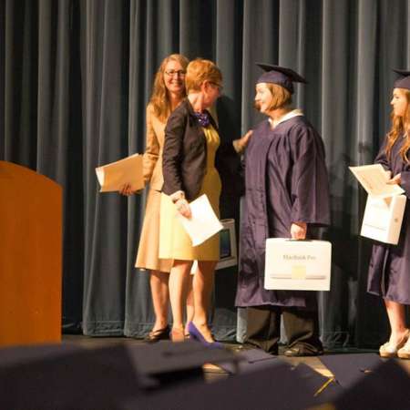 Students receive their Scholarships at the Awards Assembly.