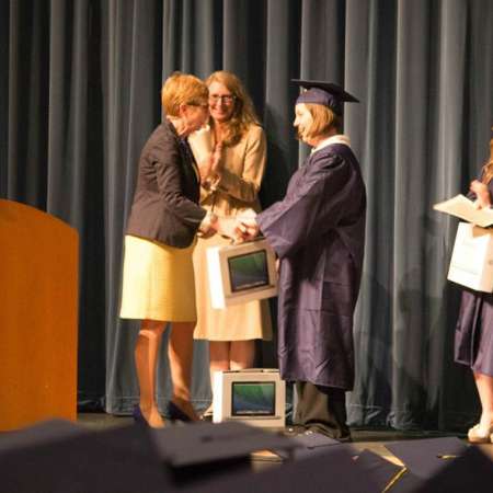 Students receive their Scholarships at the Awards Assembly.