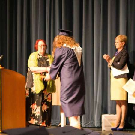 Students receive their Scholarships at the Awards Assembly.