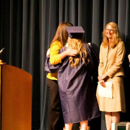 Students receive their Scholarships at the Awards Assembly.