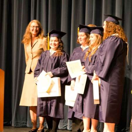 Students receive their Scholarships at the Awards Assembly.