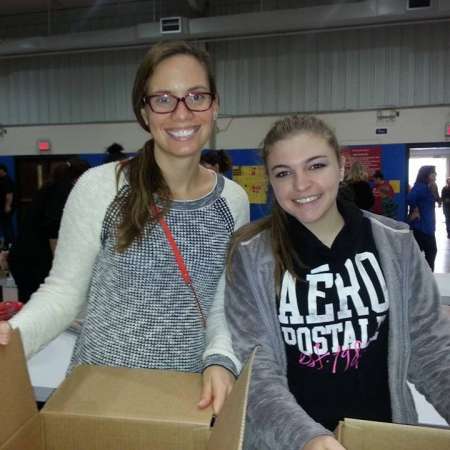 Volunteers pack their boxes.