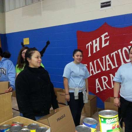 Volunteers work on organizing boxes.