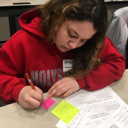 Marisol practicing taking notes before going to OSU.