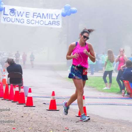 Runner slows after finishing the race.