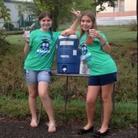 Christina G. and Samantha G. at the water stop midway.