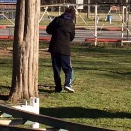 Students, parents, and mentors help to clean up Kiddie Park.