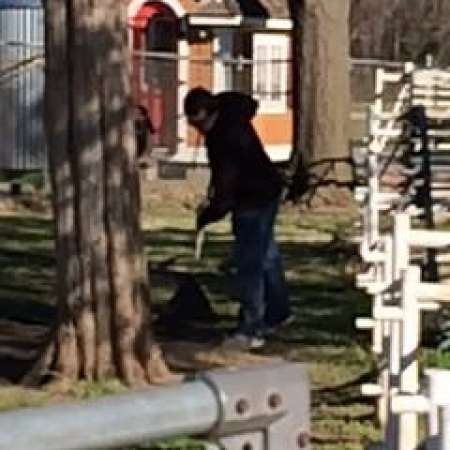 Students, parents, and mentors help to clean up Kiddie Park.