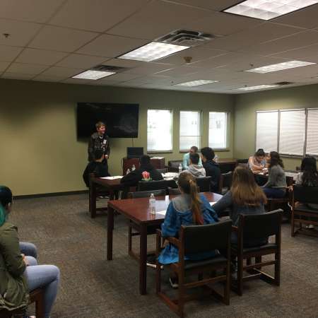 Students attend a session on public speaking.