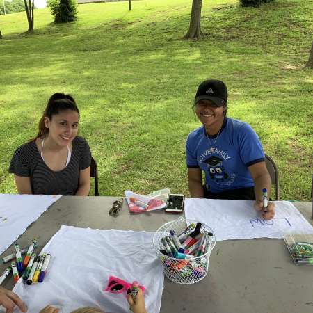 Daisy and Mariel volunteer at SunFest.