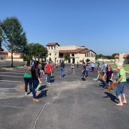 Scarf tossing activity.