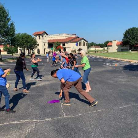 Outside relay activity for physical activity theme.