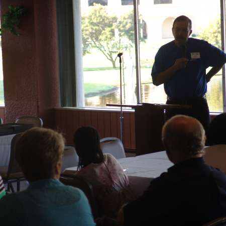 Barry Lowe speaking to group.