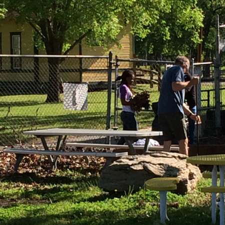 Raking Leaves and cleaning up the fenceline of the park.