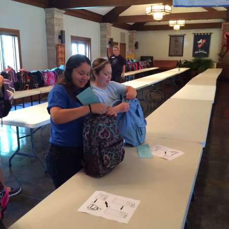 Marisol and Maricela finish packing their bags.