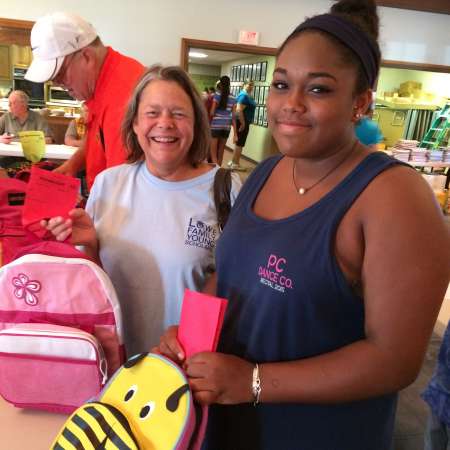 Jade and Linda pose with their backpacks.