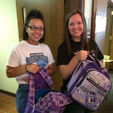 Keyonna and Teresa pose with their backpacks.