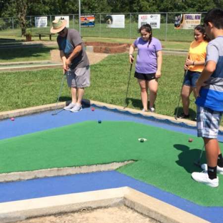 Felix tries to get out of the water in order to meet par.