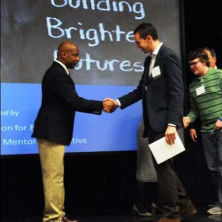 Stephen accepts award.