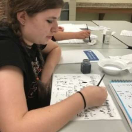 Christina and Cristina take a Calligraphy class using mini grant.