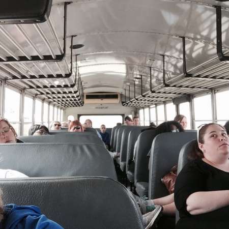 Students relaxing on the way home after OSU Tour.